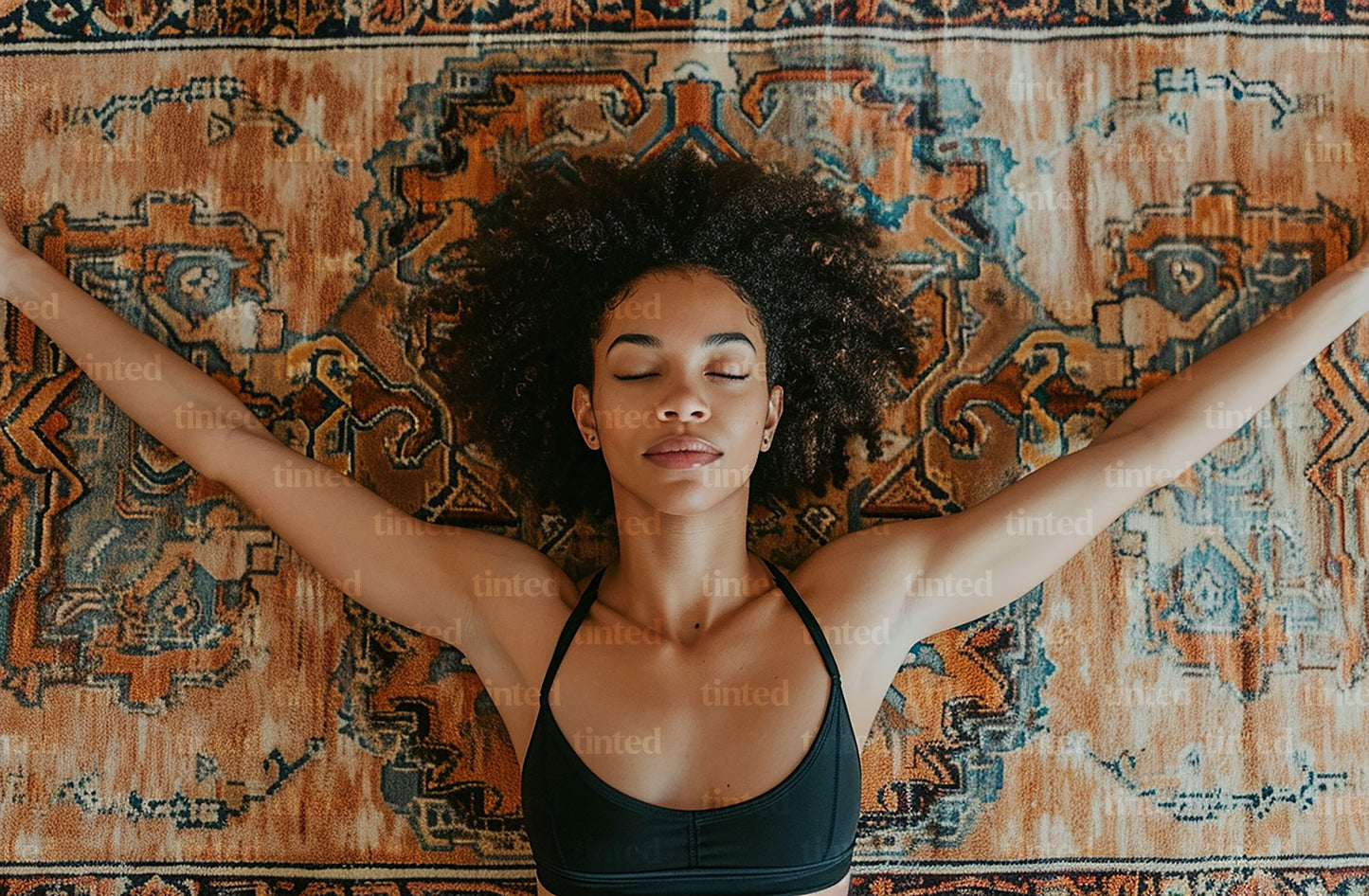 tinted-a-yoga-position-with-the-arms-extended-behind-the-head-e990539fa5e3