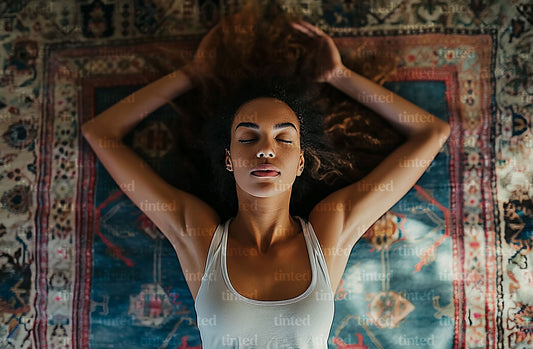 tinted-a-yoga-position-with-the-arms-extended-behind-the-head-059b29d11b8f