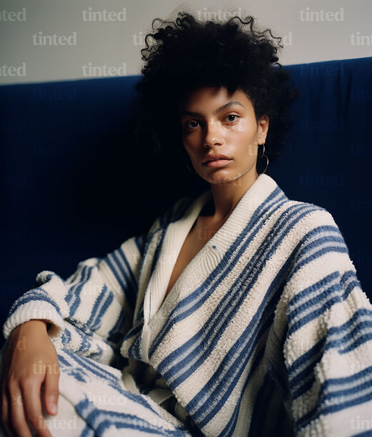 tinted-a-young-woman-sitting-on-the-couch-wearing-a-blue-84c7d0f96410