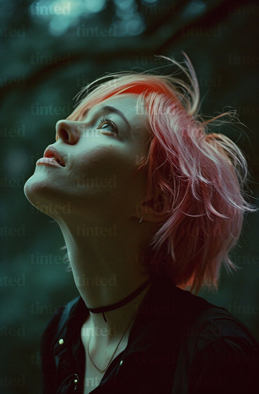 tinted-an-image-of-a-woman-with-pink-hair-looking-up-4ec2ab3e784a