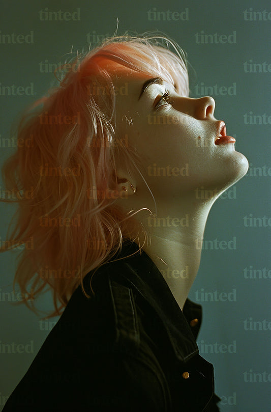 tinted-an-image-of-a-woman-with-pink-hair-looking-up-bb6fc88d0900