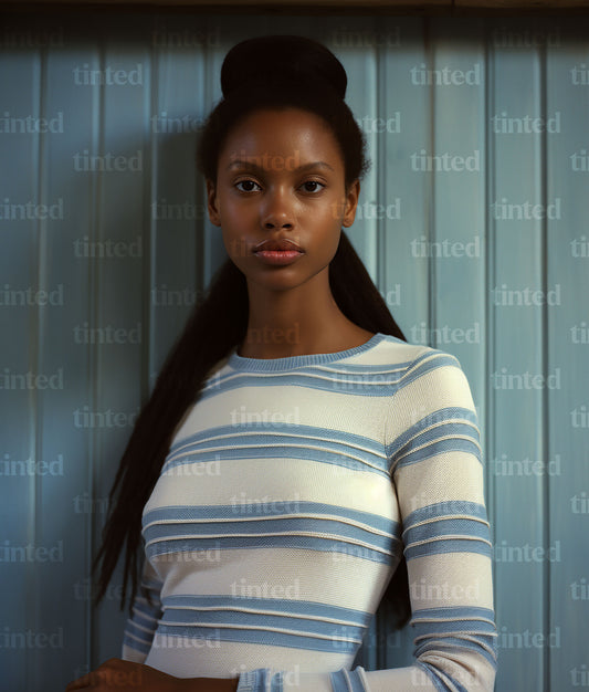 tinted-black-woman-in-blue-and-white-sweater-d972f7ba1a30