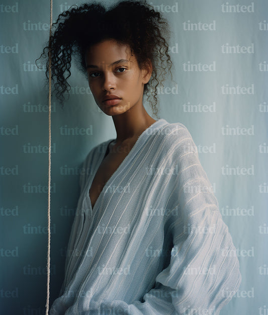 tinted-black-woman-wearing-blue-striped-cardigan-3111c19b23cd
