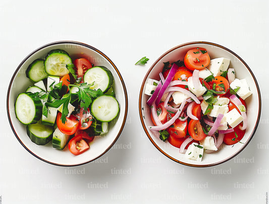 tinted-two-bowls-of-cucumber-tomato-onions-and-feta-salad-07ba72e53421