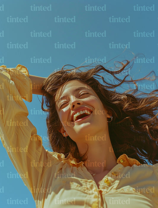 tinted-woman-smiling-with-hand-with-hands-in-her-hair-f1fa7de21743